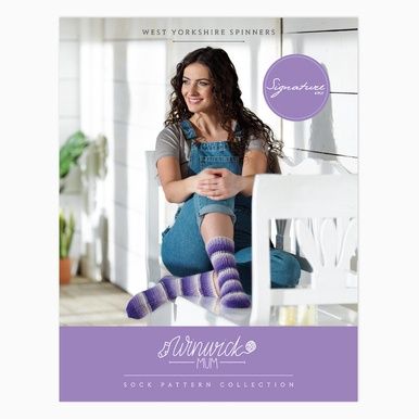 The front cover of the book, showing a woman wearing a pair of variegated purple knitted socks.