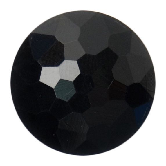 A round black faceted button.