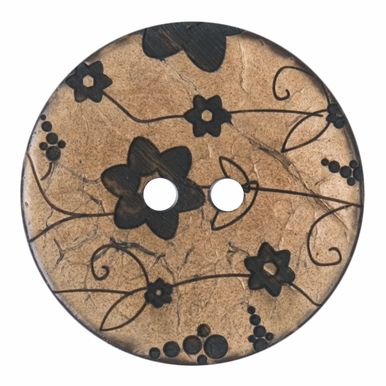 A brown wooden button with a black floral design.