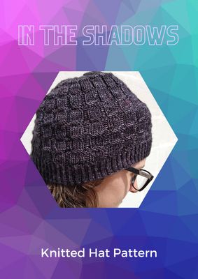 The front cover of the pattern. The background is a purple, blue and teal geometric deisgn, with the title at the top and a photo of the hat in the centre.