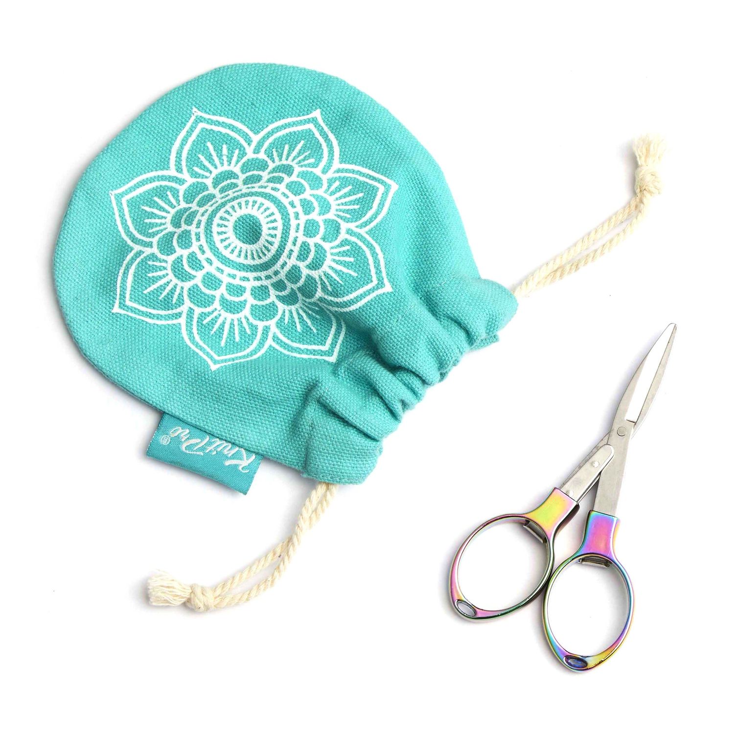 A pair of scissors alongside the fabric storage pouch.