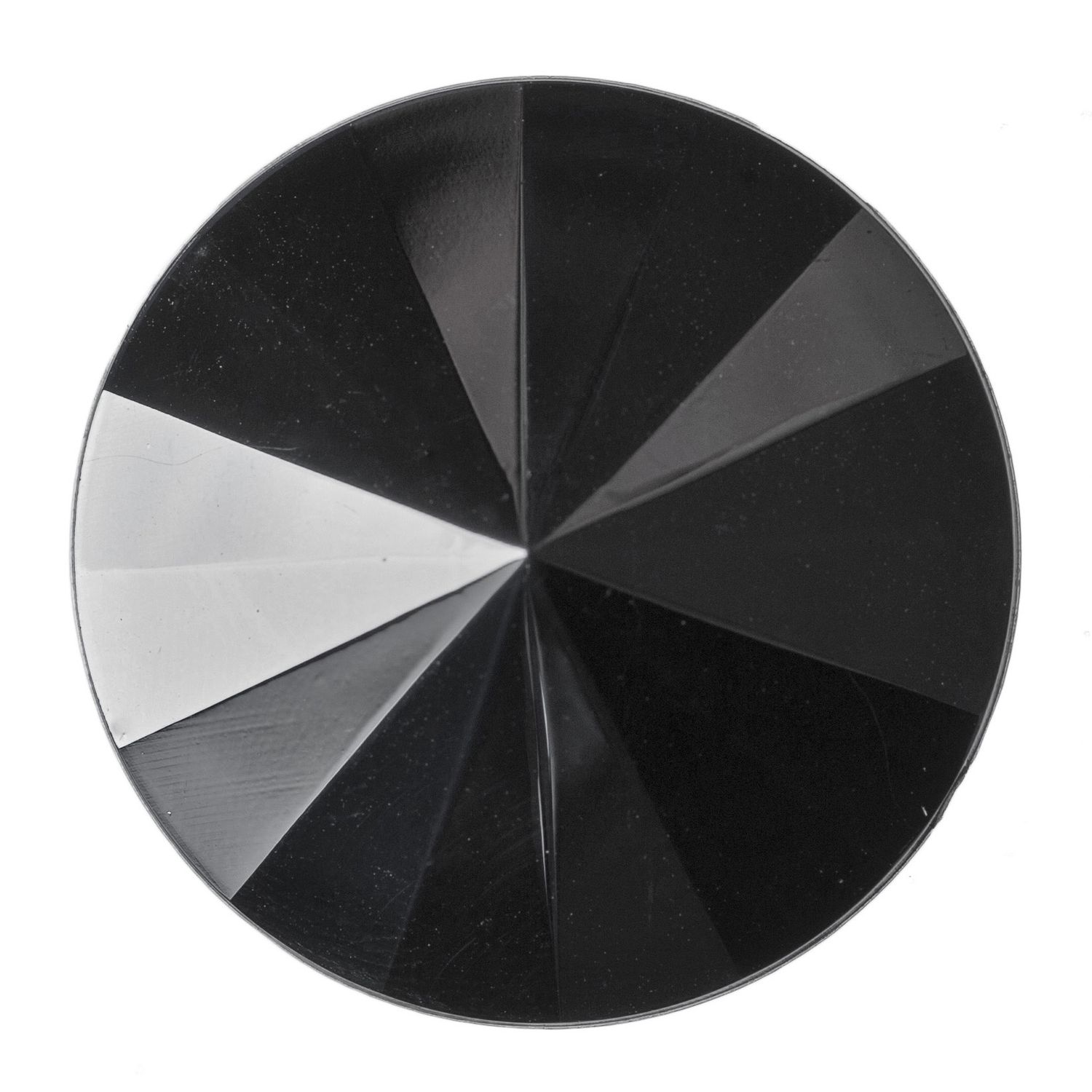 A round black faceted button.