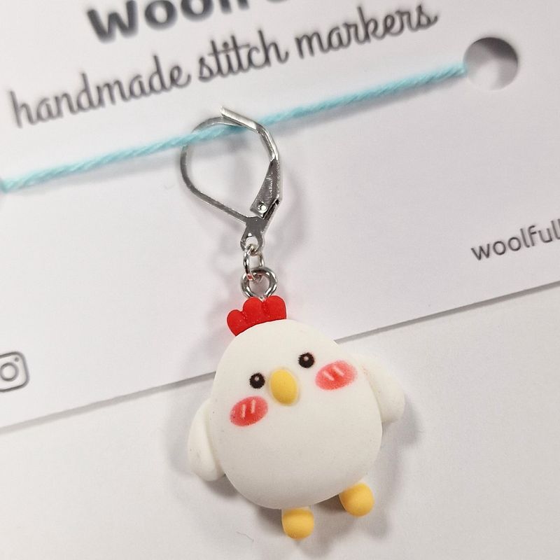 A chicken shaped stitch marker.