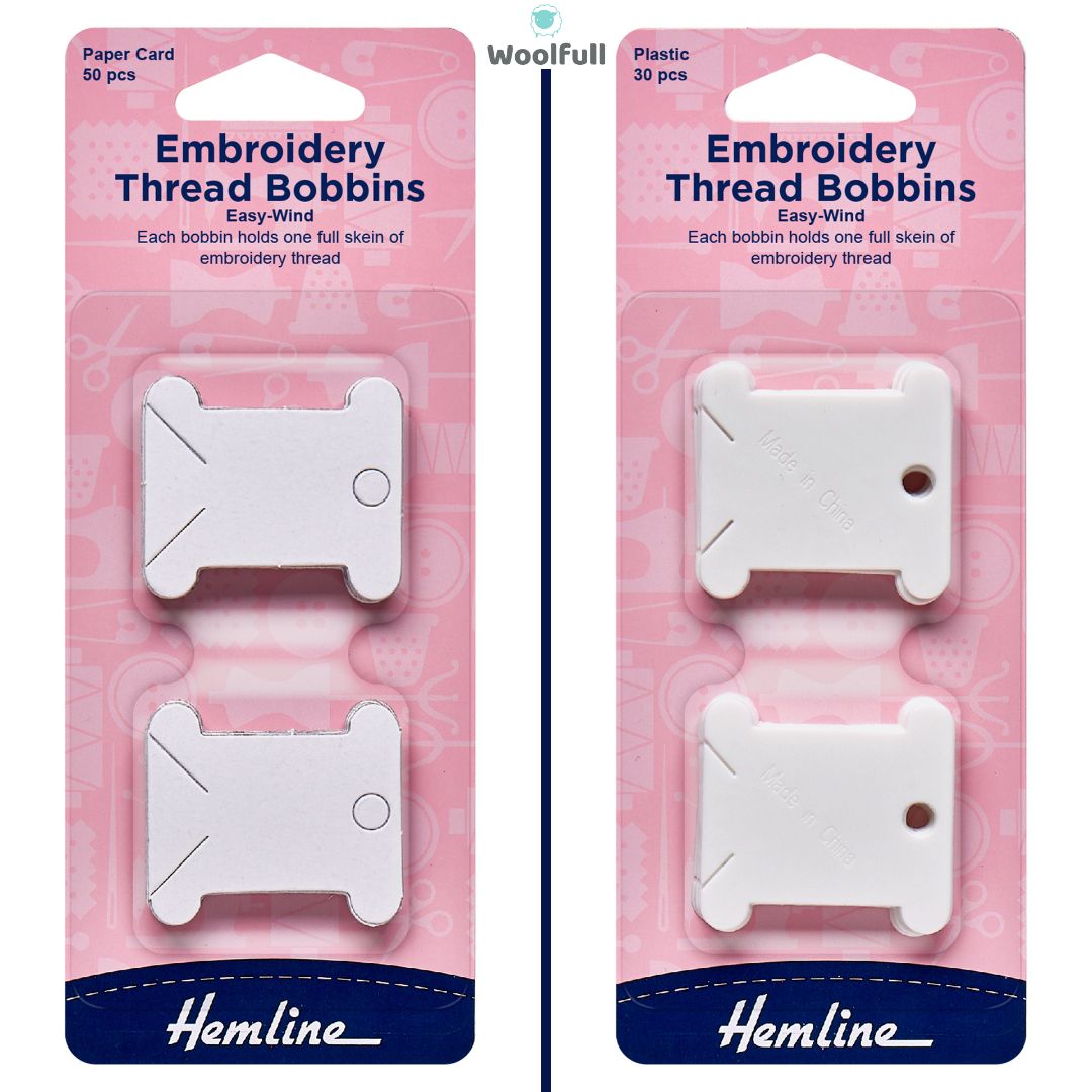 2 packs of thread bobbins, 1 paper and 1 plastic.