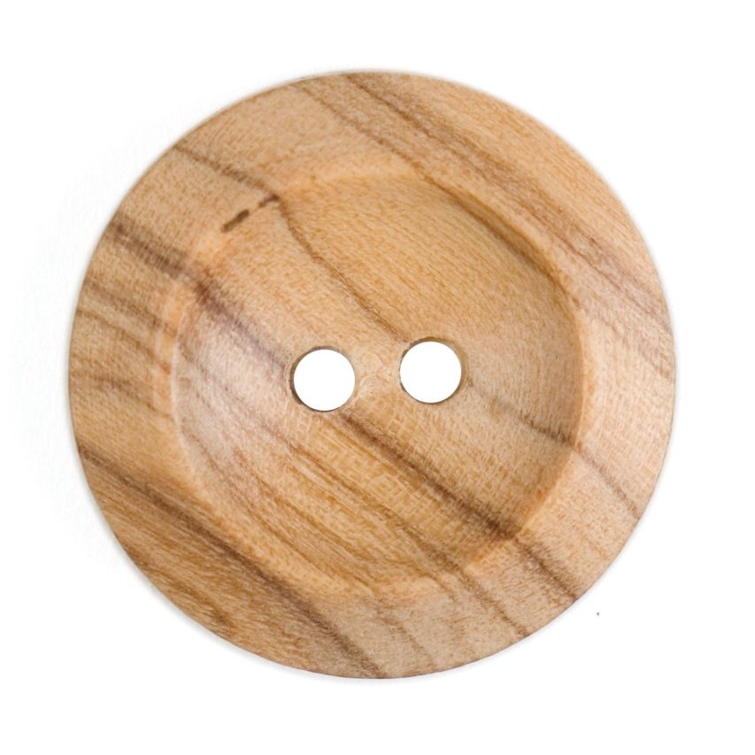 A round wooden button with a raised edge and a dip in the centre.