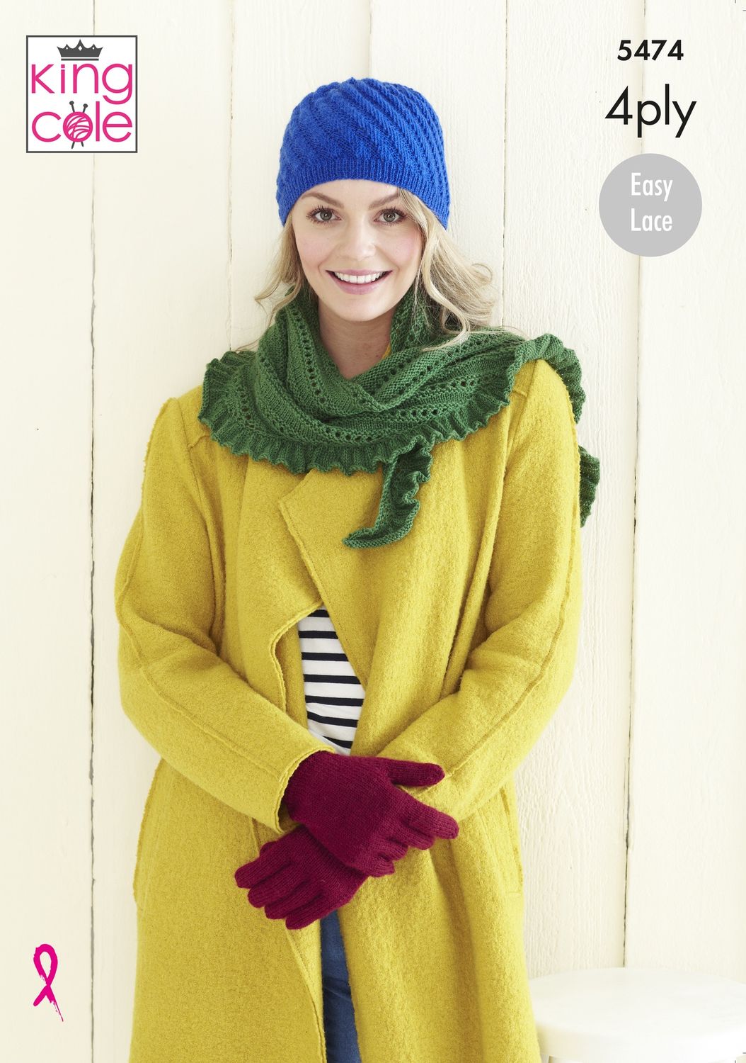 A woman in a yellow coat is wearing a blue knitted hat, a green knitted wrap and red knitted gloves.