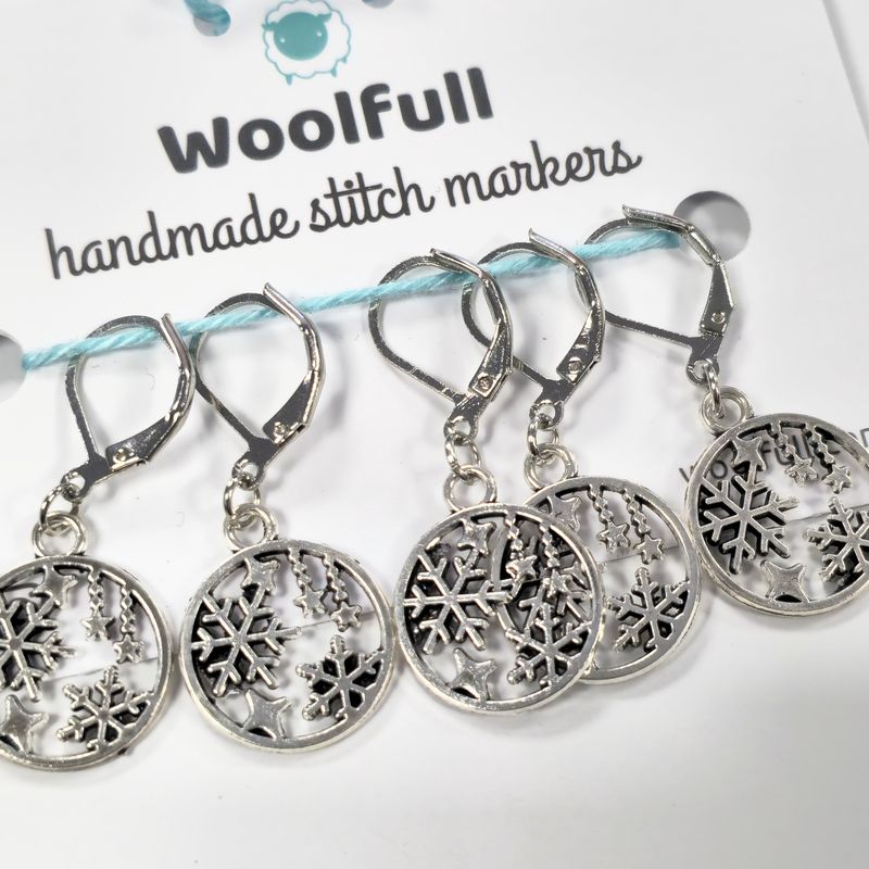 5 silver snow globe stitch markers.