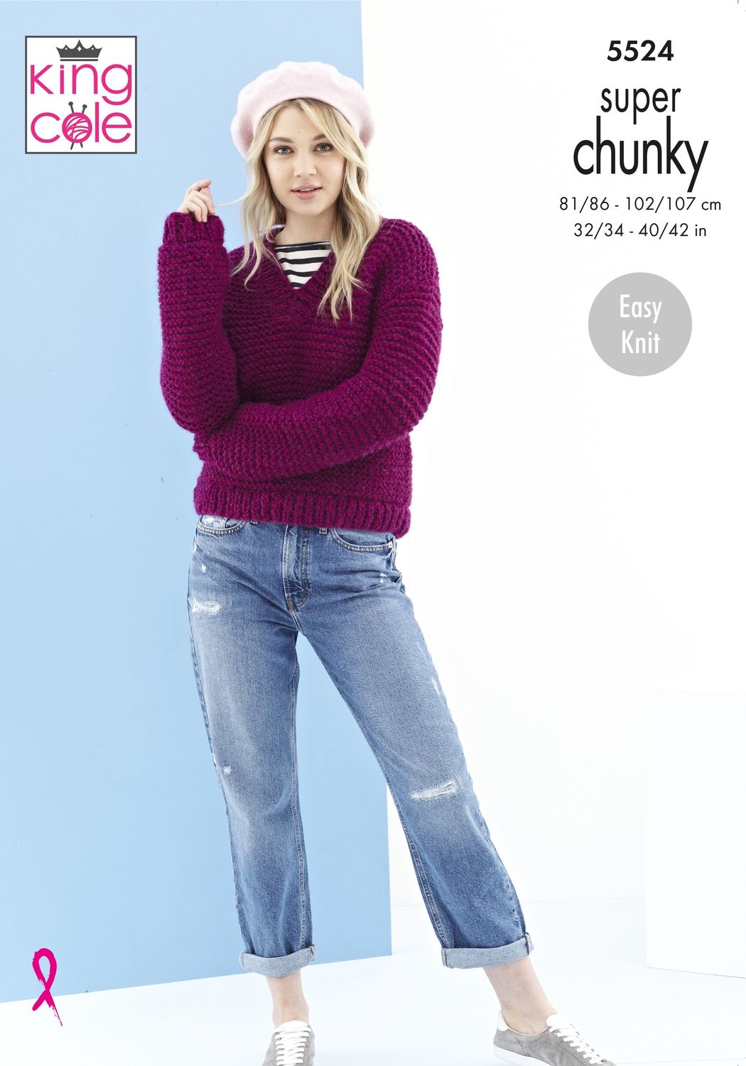 A woman is wearing a burgundy knitted sweater.
