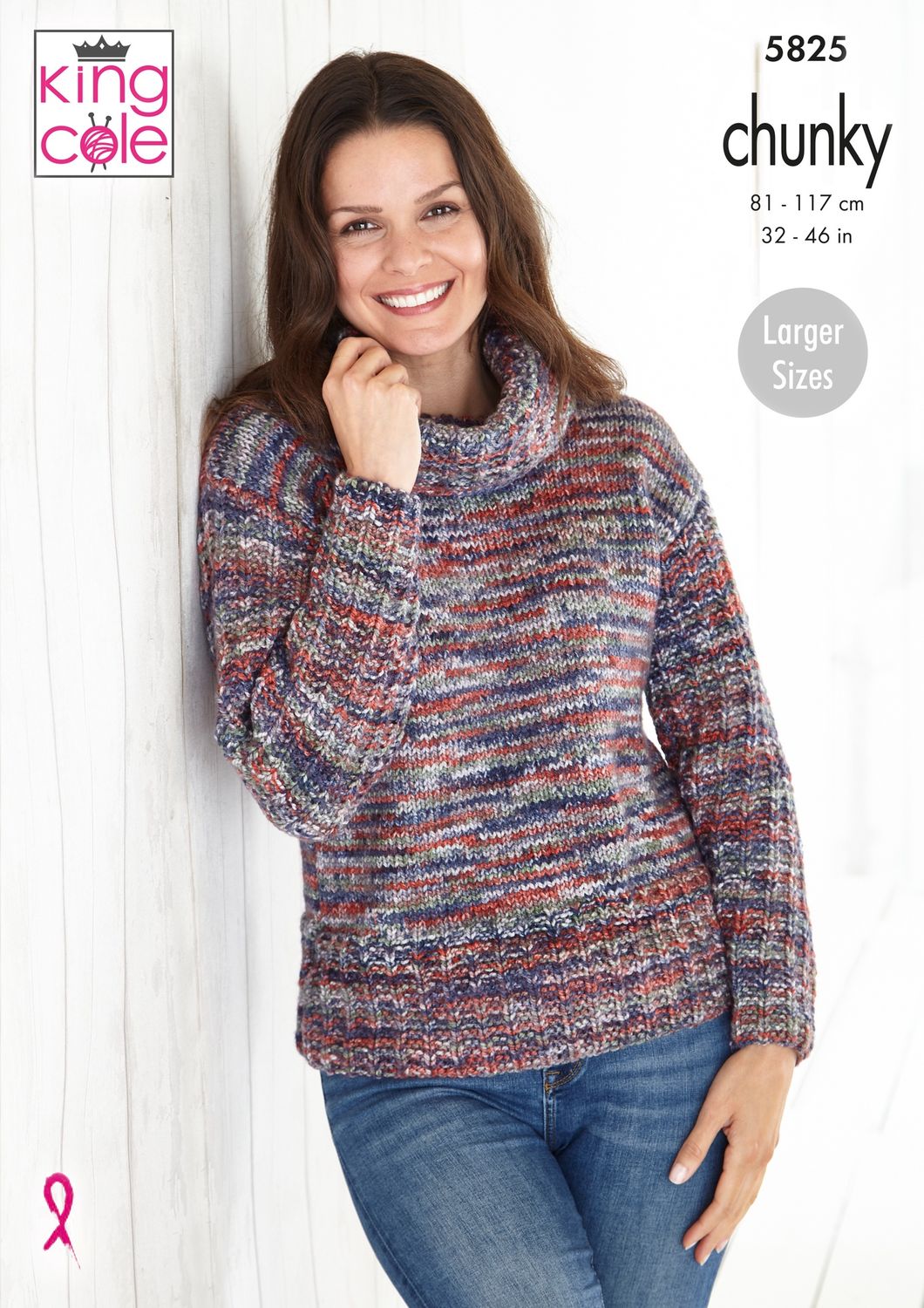 A woman is wearing a knitted sweater in a variegated red and blue yarn.