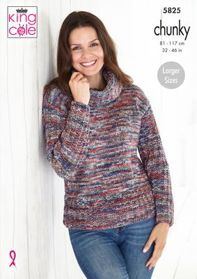 A woman is wearing a knitted sweater in a variegated red and blue yarn.
