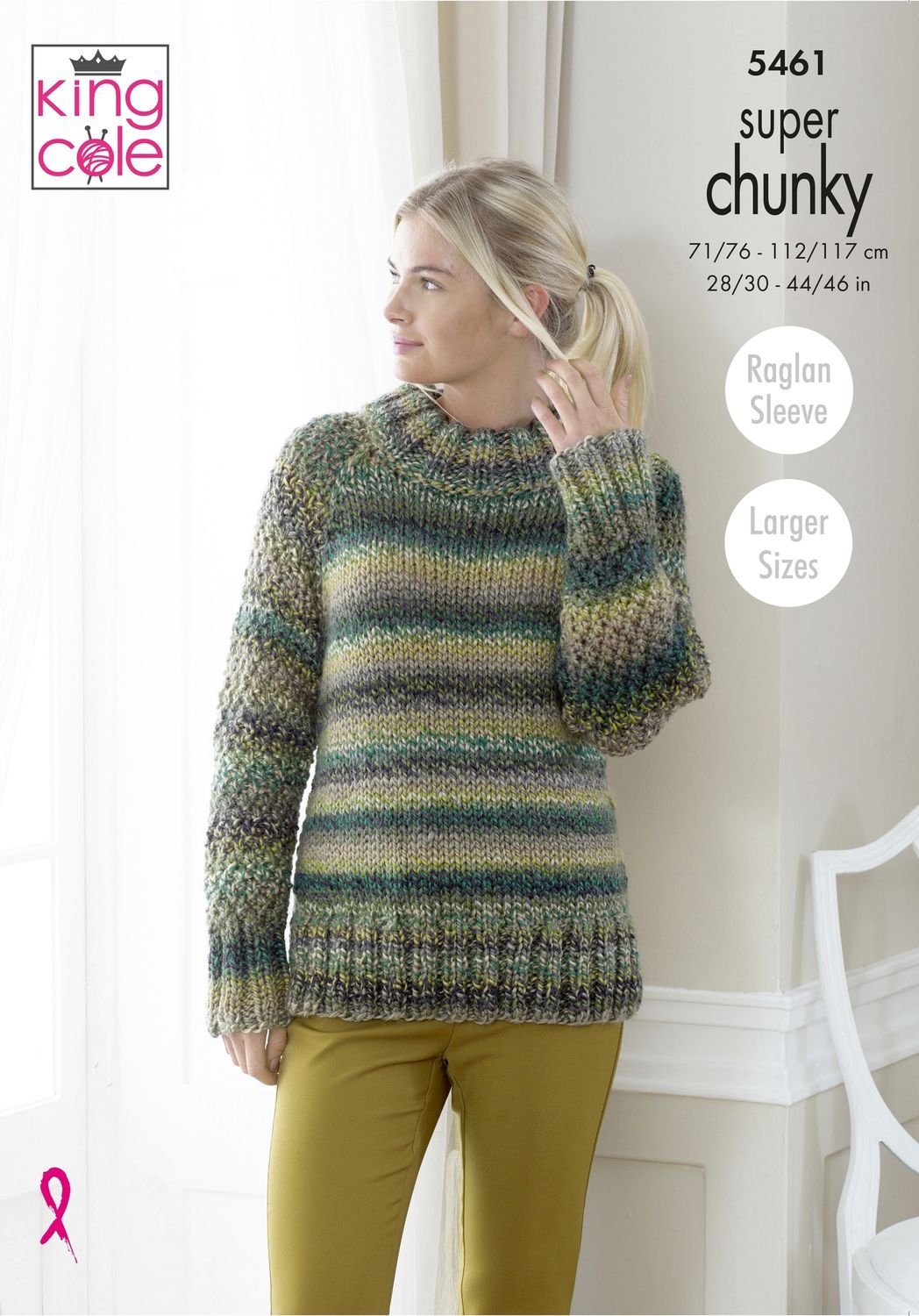 A woman is wearing a knitted sweater in a variegated green yarn.