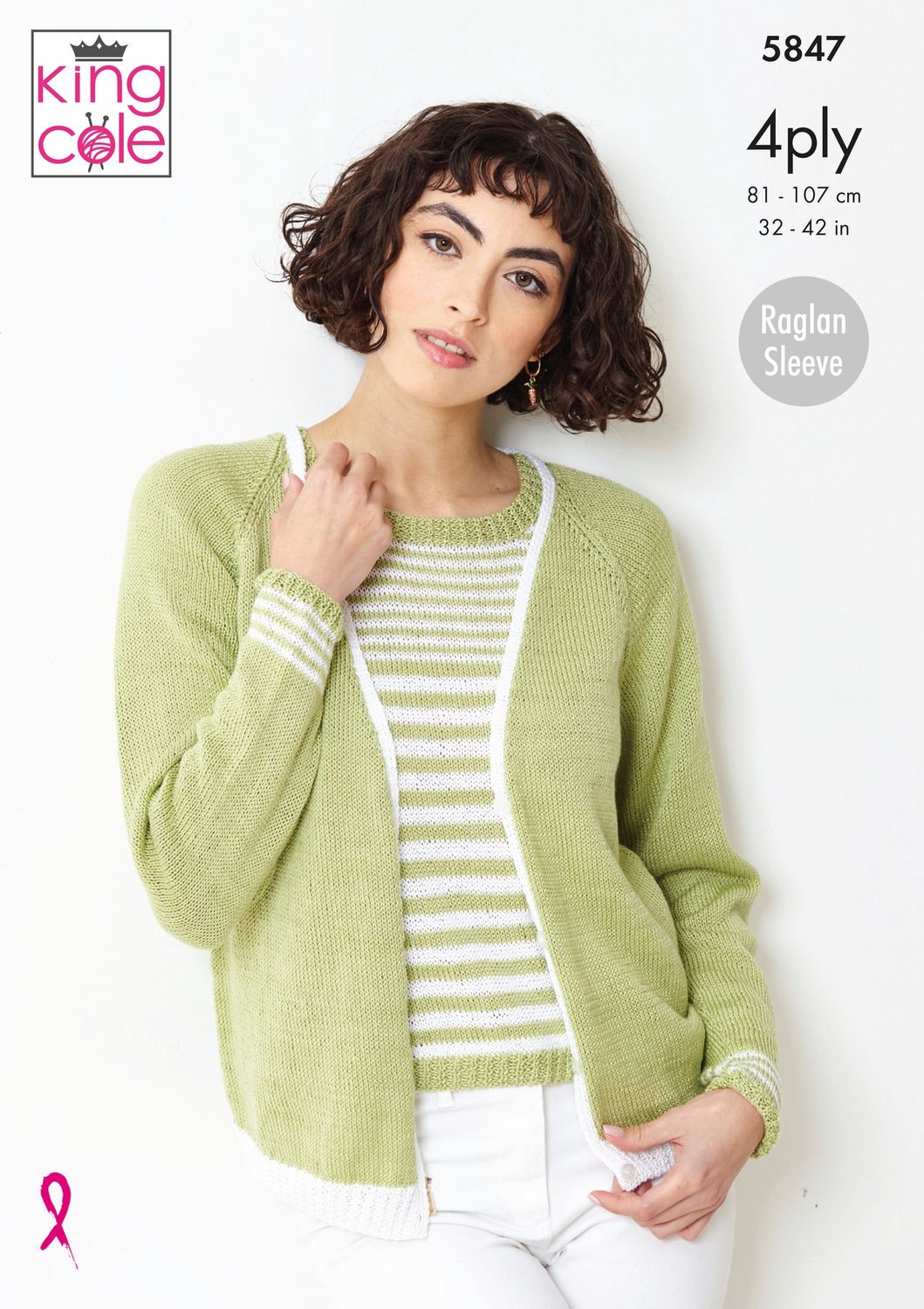 A woman is wearing a knitted top in green and white stripes, with a green knitted cardigan.