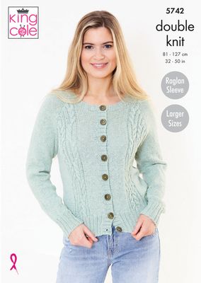 A woman is wearing a mint green knitted cardigan with cable down the front.