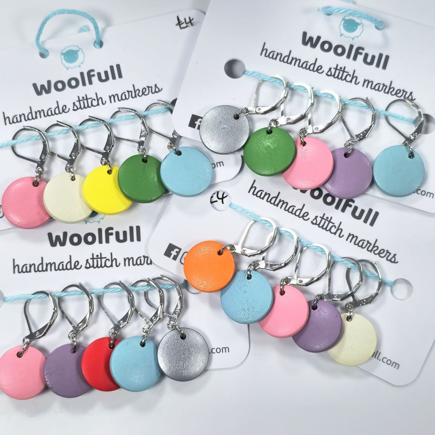 4 packs of stitch markers, each with 5 brightly coloured wooden smartie stitch markers.