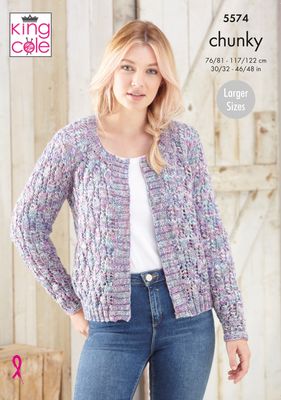 A woman is wearing a knitted cardigan in a variegated purple and pink yarn.