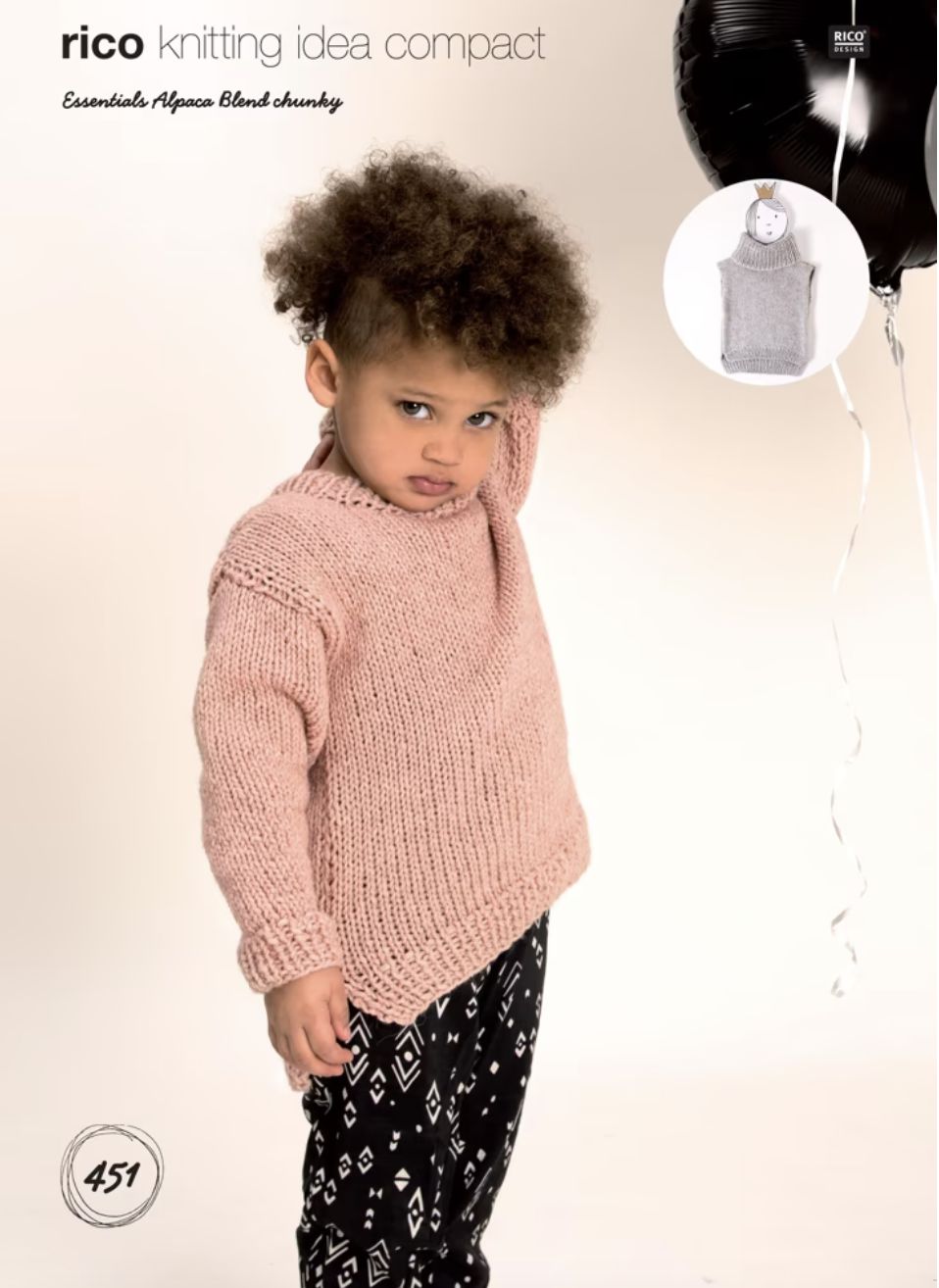 A girl is wearing a pink knitted sweater.