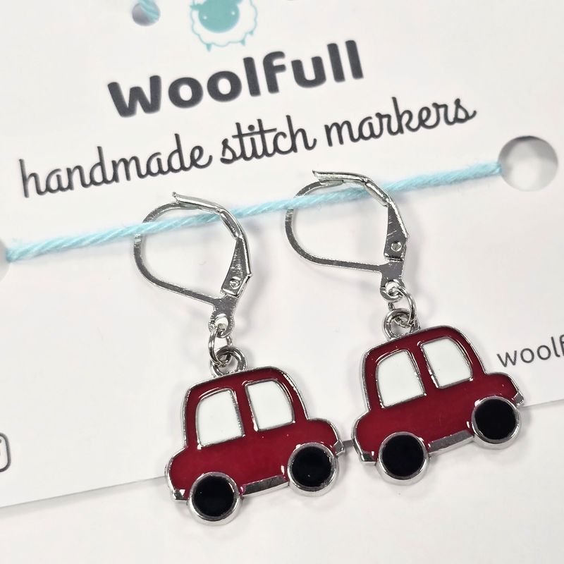 2 red car shaped stitch markers.