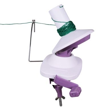 The white and purple wool winder in use.