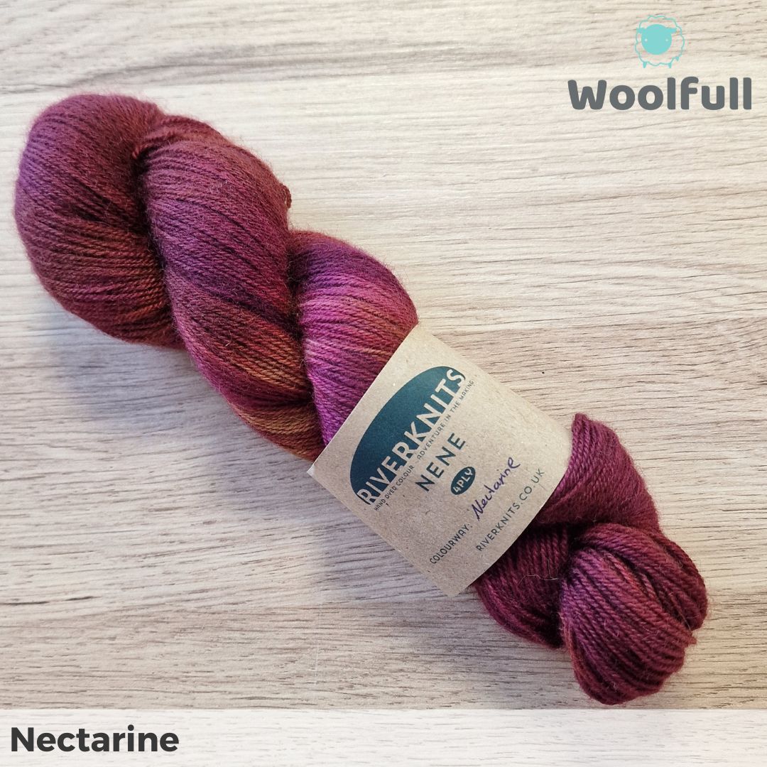 A skein of yarn in a slightly tonal deep red.