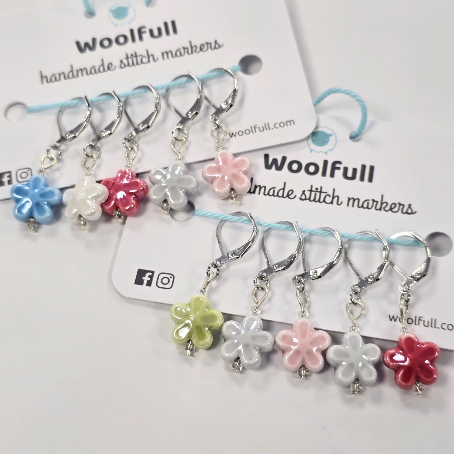 2 packs of 5 ceramic flower shaped stitch markers.