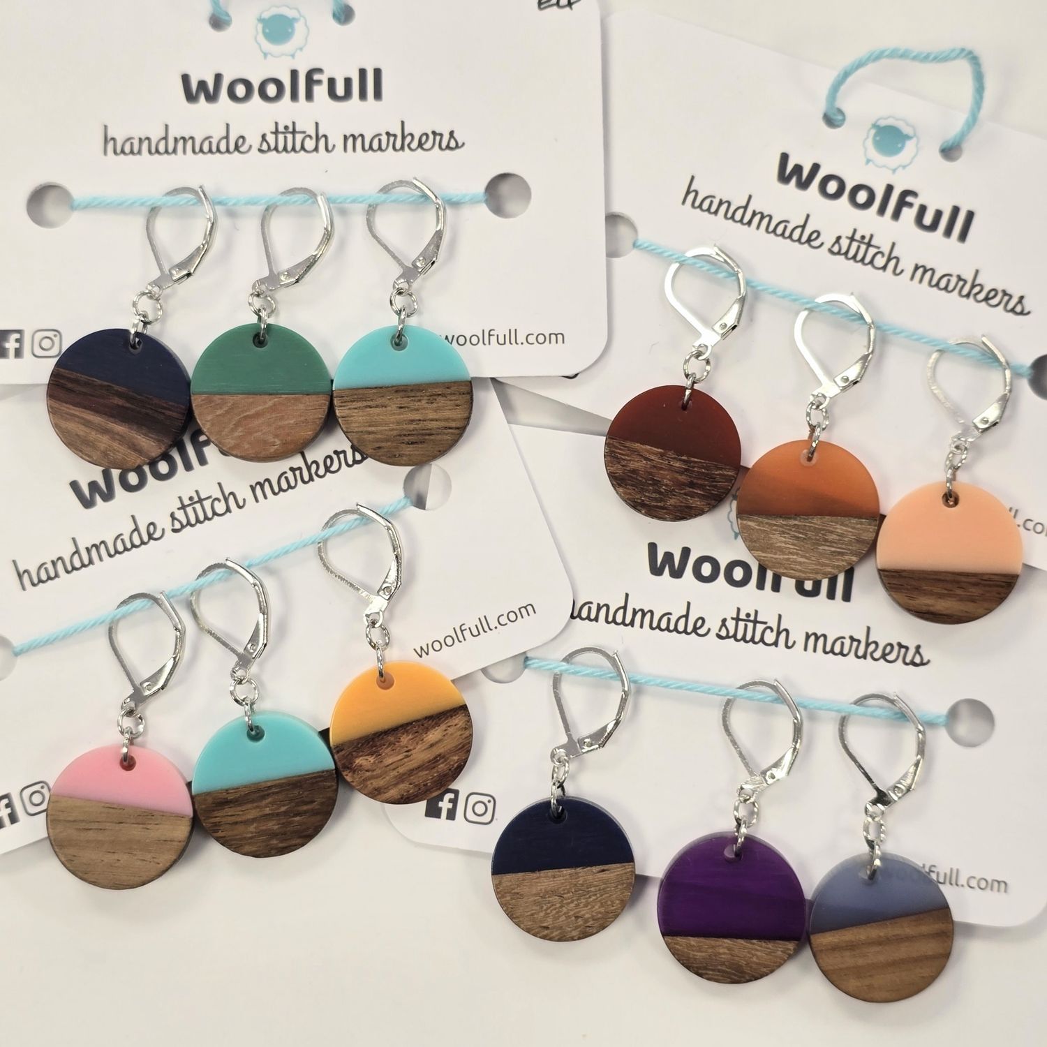 4 packs of 3 wood and resin circle shaped stitch markers.
