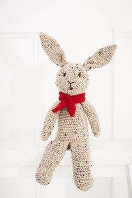 A cream coloured crocheted hare.