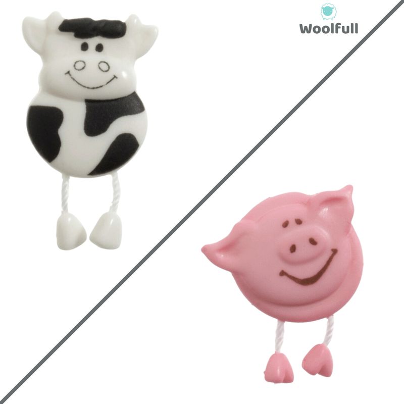 A cow button and a pig button, both with dangly legs.