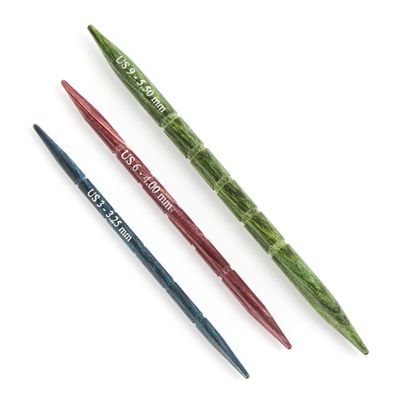 3 wooden cable needles, in blue, pink and green.