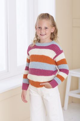 A girl is wearing a cream, pink, orange and pale blue stripy knitted sweater.