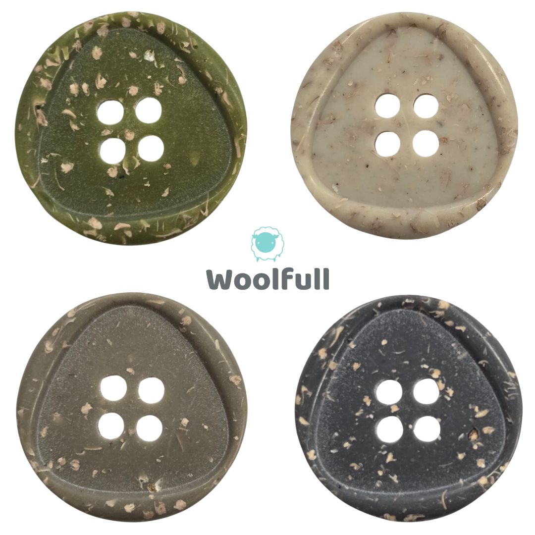 4 buttons in khaki green, cream, beige and grey, each with subtle flecks.