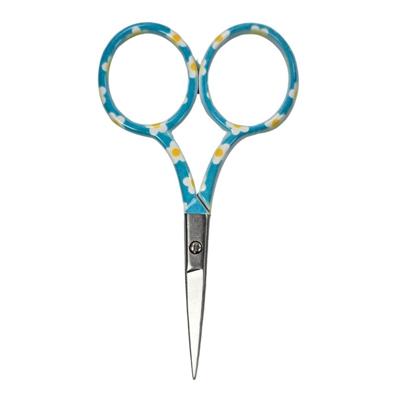 A pair of blue embroidery scissors with yellow and white daisy print.