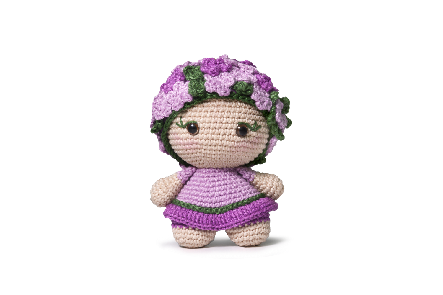 A purple crochet doll dressed like a violet flower.