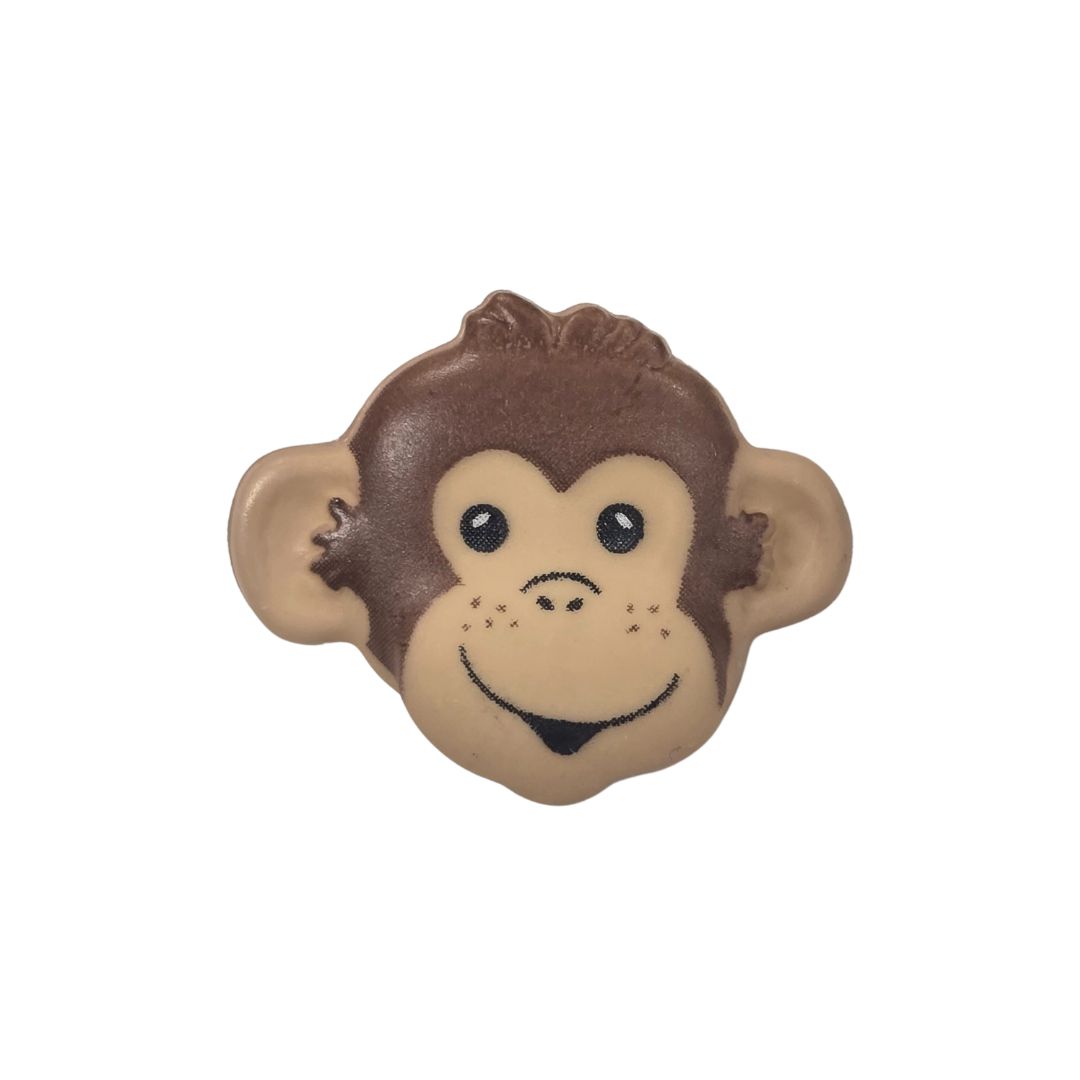 A brown, monkey face shaped button.