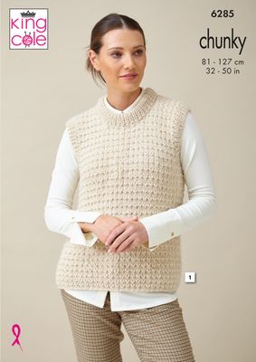A woman is wearing a cream textured knitted slipover.