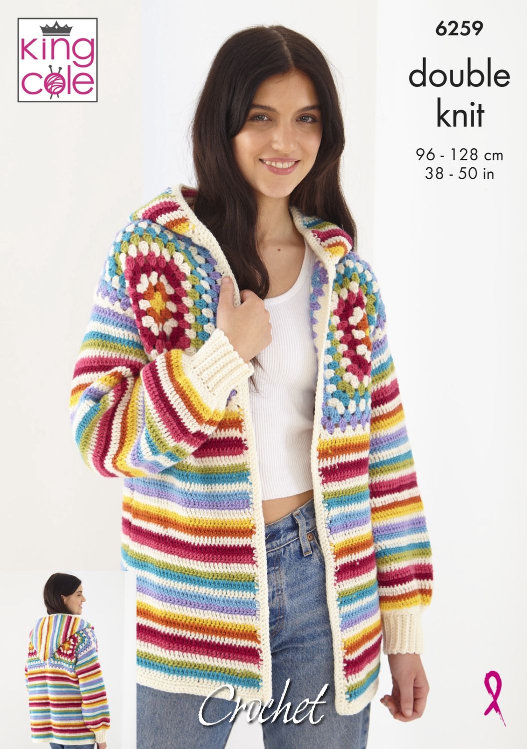A woman is wearing a crocheted granny square cardigan in cream, red, orange, yellow, green, blue and purple.