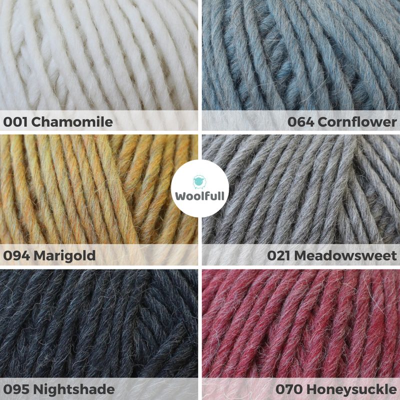 A shade card showing the 6 colours of yarn, in cream, blue, mustard yellow, light grey, dark grey and red.