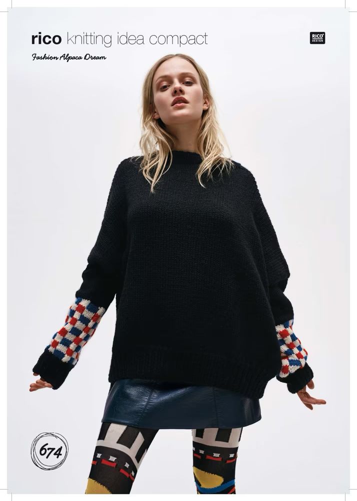A woman is wearing an oversized black knitted sweater, with red, white and blue checked sleeves.
