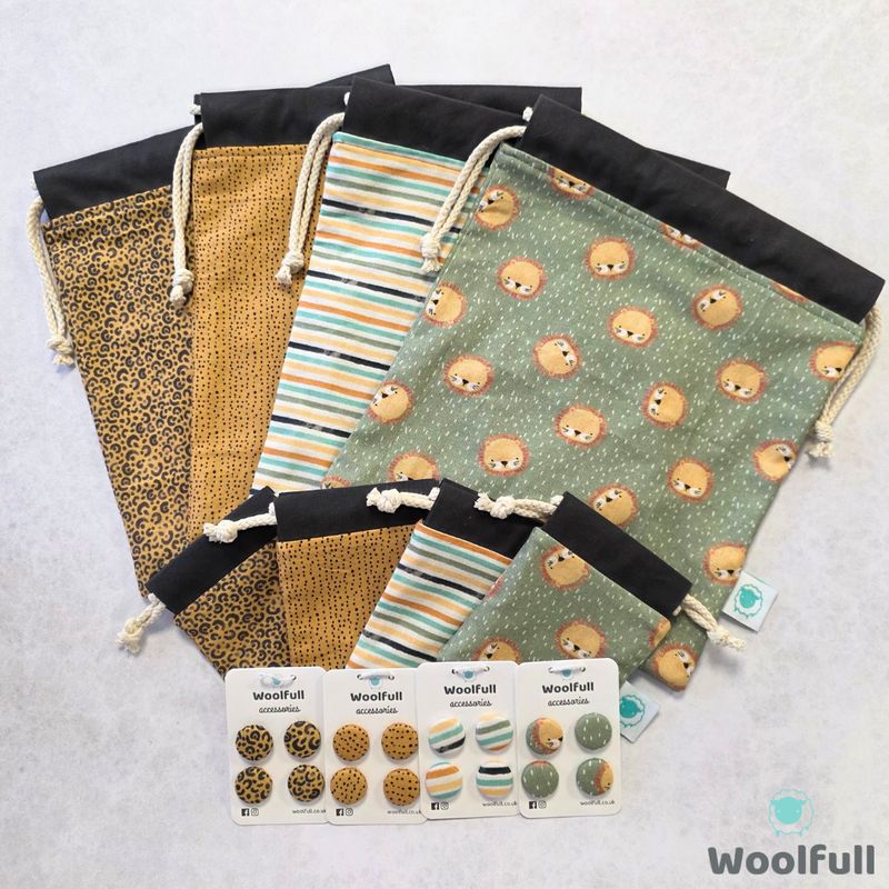 4 project bags, 4 notions pouches and 4 packs of fabric buttons, all in coordinating safari themed fabrics.