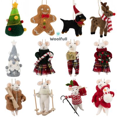 5 needle felted festive characters and 7 needle felted mice dressed in wintry clothing.
