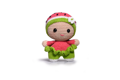 A green and red crocheted watermelon doll toy.