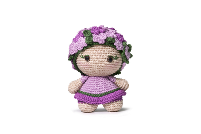 A purple crochet doll dressed like a violet flower.