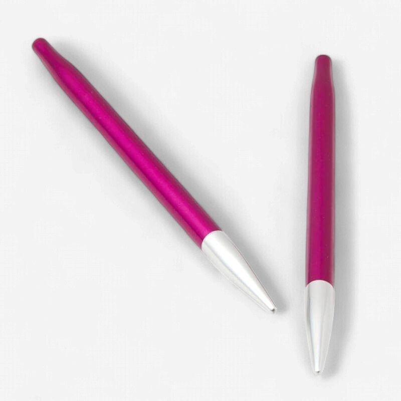 A pair of pink metal interchangeable needles.