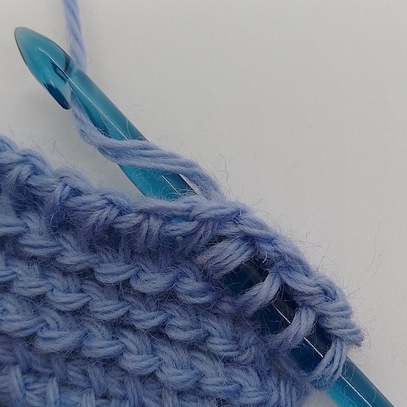 A small swatch of Tunisian crochet stitches.