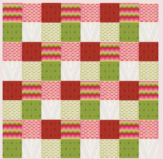 A knitted blanket made up of red, white and green floral and textured squares.