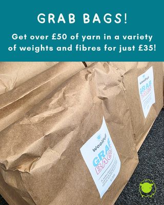 Packs of mystery yarn in brown bags.
