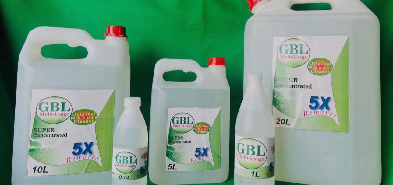 Close-up of GBL Wheel Cleaner spray action on a dirty wheel, emphasizing its strong formula that loosens tough brake dust instantly