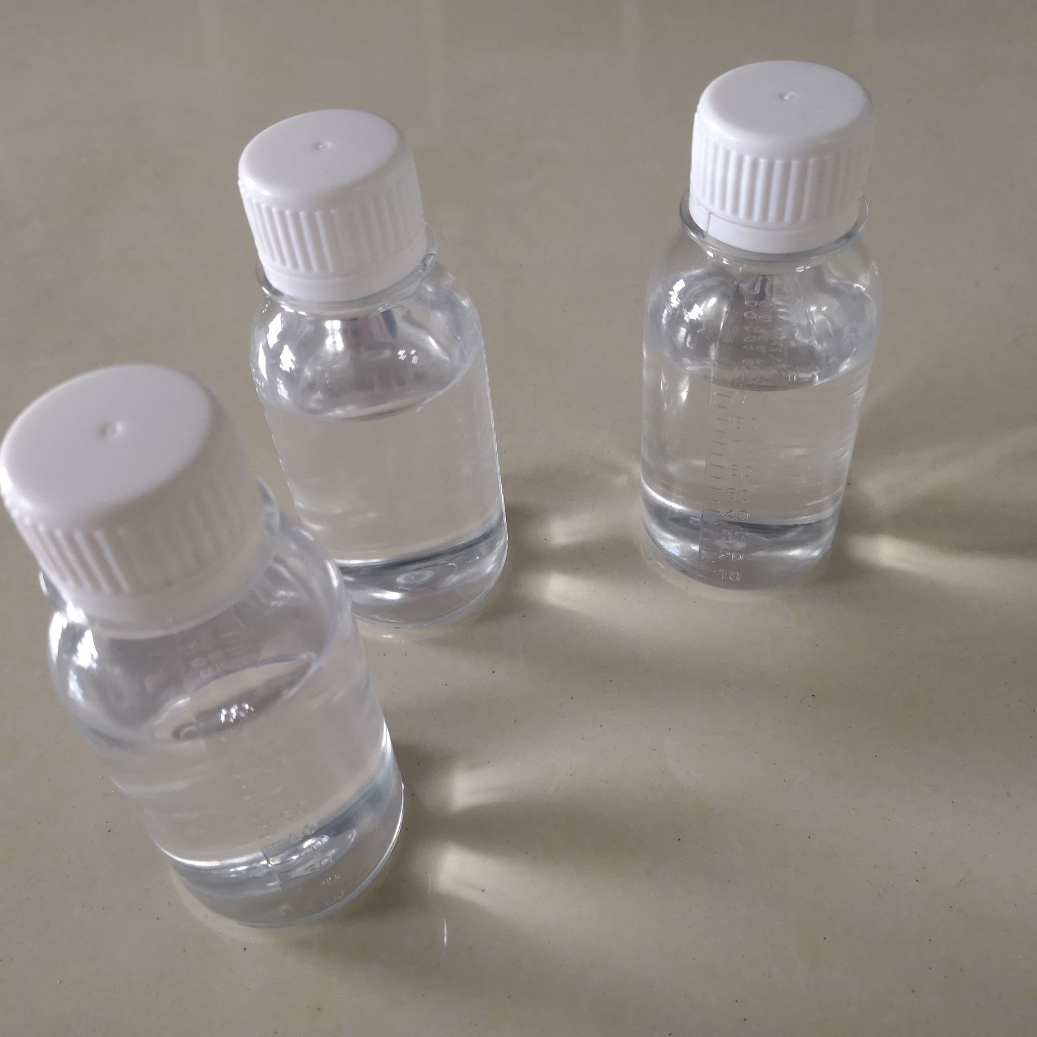 GBL Wheel Cleaner bottle standing beside a heavily soiled rim, demonstrating before-and-after effectiveness in wheel cleaning