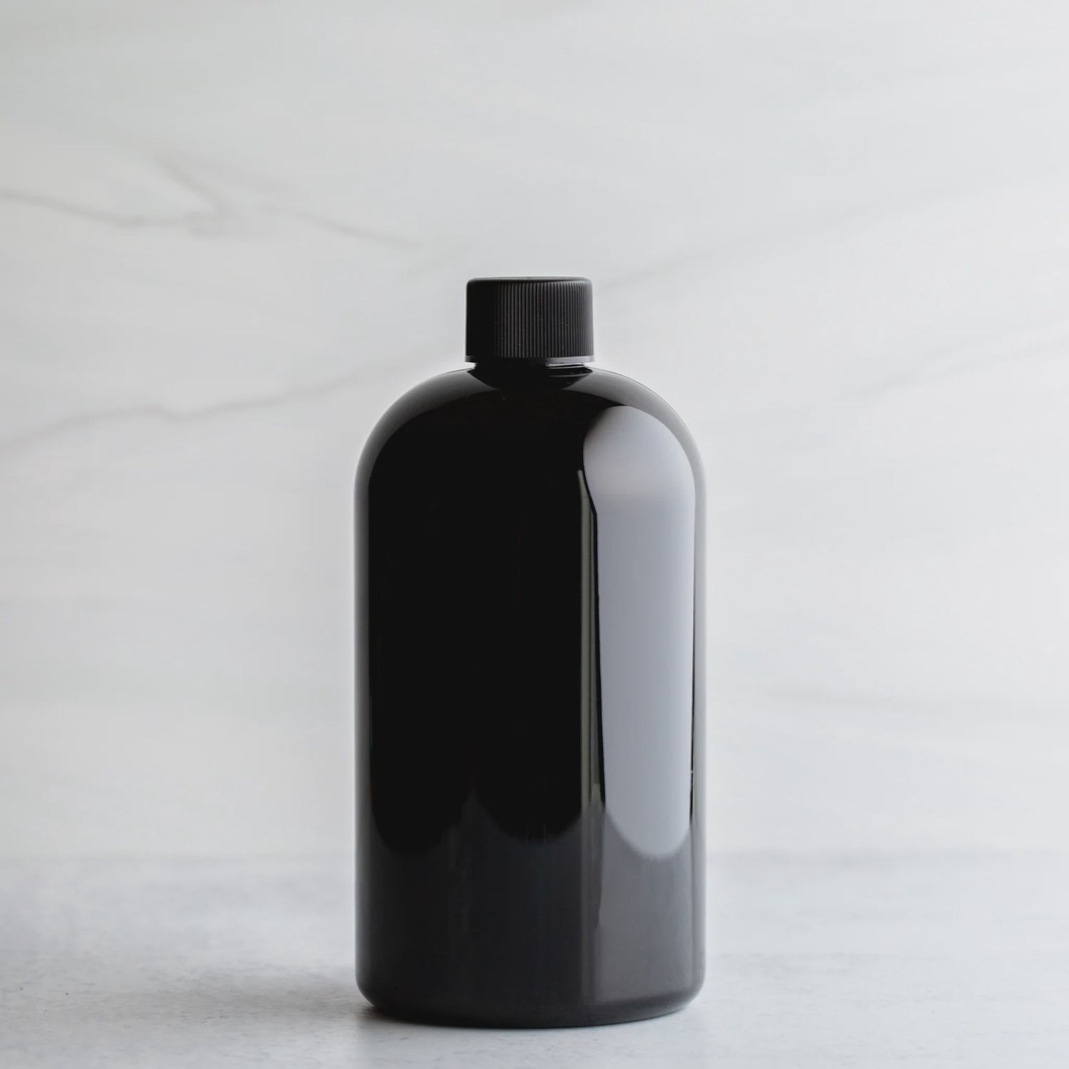 Black Plastic Bottle 4 fluid ounce