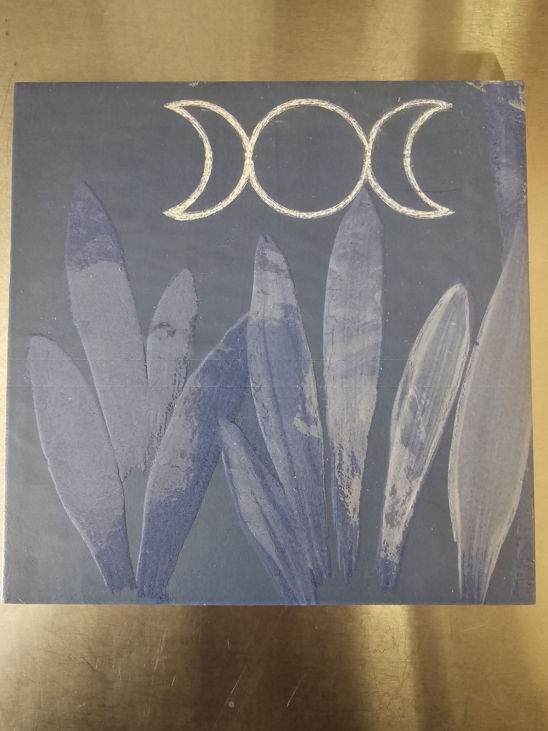 Triple Moon over Leaves