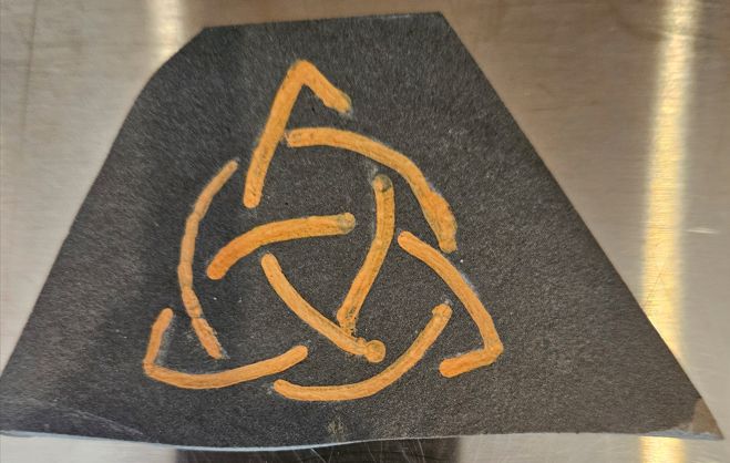 Triskele Carved into Stone